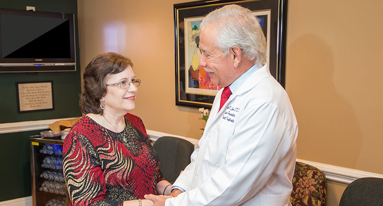 Dr. Levine welcoming patient
